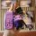 A hand holds a purple jeep leather key fob cover for compass, cherokee, and grand cherokee, featuring a cute bear charm and a...