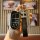 A hand holds a jeep leather key fob cover for compass, cherokee, and grand cherokee, featuring a sleek black design with a di...