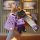 A hand holds a purple buick excelle key cover for 2008–2015 models, featuring a cute bear charm and a stylish strap with fash...