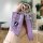 A hand holds a purple bmw key cover with a leather strap and diamond-encrusted keychain, designed for 3/5/7 series and x1/x3/...