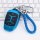 Blue lynk & co key cover for 01/02/03, featuring a premium leather strap and sleek design, displayed on a keyboard background...