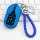Blue maserati key cover for levante & ghibli, featuring a braided leather keychain and sleek design, displayed on a keyboard ...