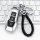 Ford key cover for focus, mondeo, edge & explorer, featuring a sleek metallic design with a braided leather keychain, display...
