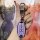 A hand holds a sleek, purple nissan key cover for models like sylphy, teana, and x-trail, featuring a metallic clip and prote...