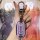 A hand holds a sleek, lavender infiniti q50l key cover with a metallic finish and functional buttons, set against a vibrant, ...