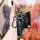 A hand holds a sleek black kd a30 ds master key cover for mitsubishi lancer, featuring a goodluck strap and a car emblem keyc...