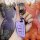 A hand holds a purple vvdi blade-style foldable car key cover, showcasing its sleek design with a metallic keychain, against ...