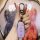 A hand holds a sleek, lavender-colored ideal one key cover 2021 premium leather case, showcasing its elegant design and funct...