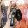 A hand holds a sleek nissan key cover for sylphy, x-trail, and teana, featuring a black leather strap with the nissan logo an...