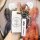 A hand holds a sleek white chery key cover for tiggo 3, tx, and tiggo 7, featuring a premium leather strap with the chery log...