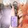 A hand holds a purple toyota key cover with a sleek design, featuring buttons for lock, unlock, and alarm, compatible with mo...