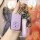 A hand holds a stylish purple toyota key cover with a matching fob and strap, featuring the toyota logo, designed for models ...