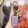 A hand holds a sleek, lavender baojun key cover for models 510/730/530/360/310w/e200/630, featuring a modern design with a me...